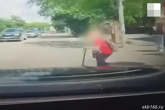 In Yekaterinburg, a driver hit a young scooter rider who suddenly rode onto the zebra crossing.