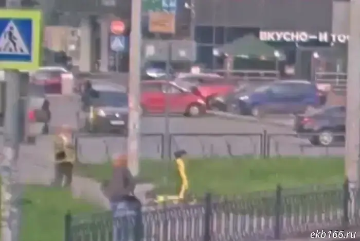 In Yekaterinburg, a car hit a scooter rider. He was thrown into the air by the impact.